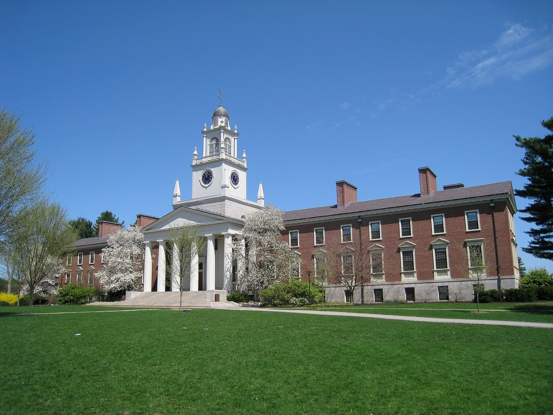 Samuel Phillips Hall at Phillips Academy Andover, with its white clock tower, in spring