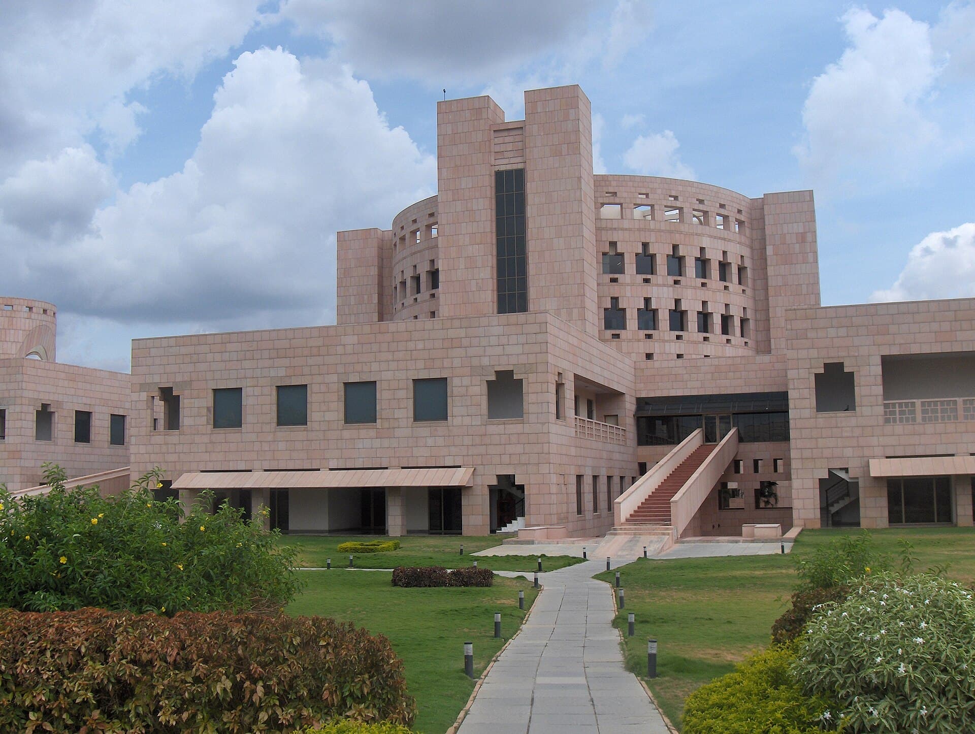 The pink sandstone main building of the Indian School of Business in Hyderabad