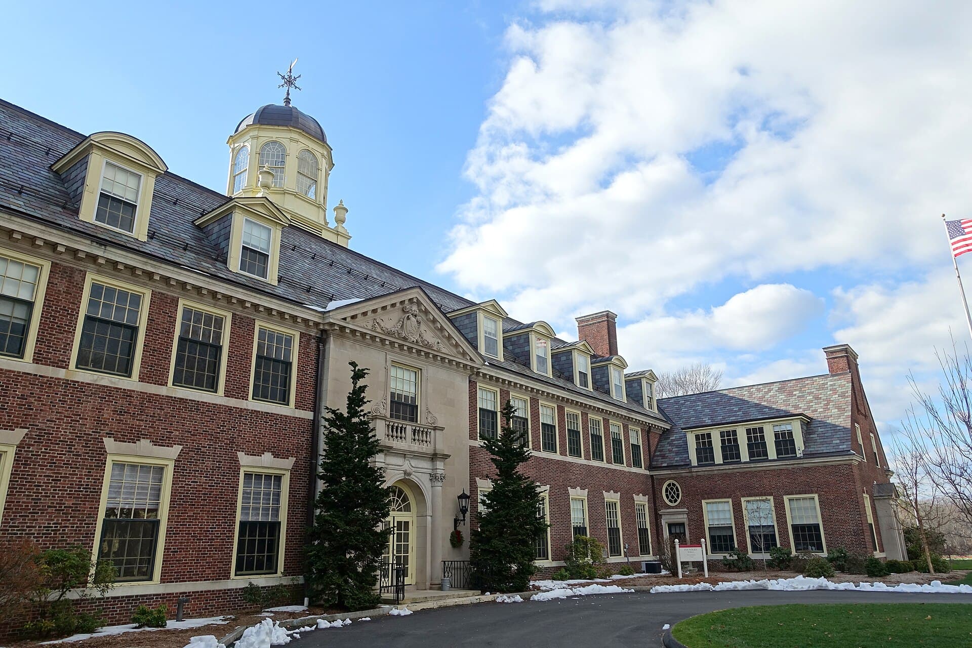 Founders Hall at the Loomis Chaffee School, a brick building with a white cupola