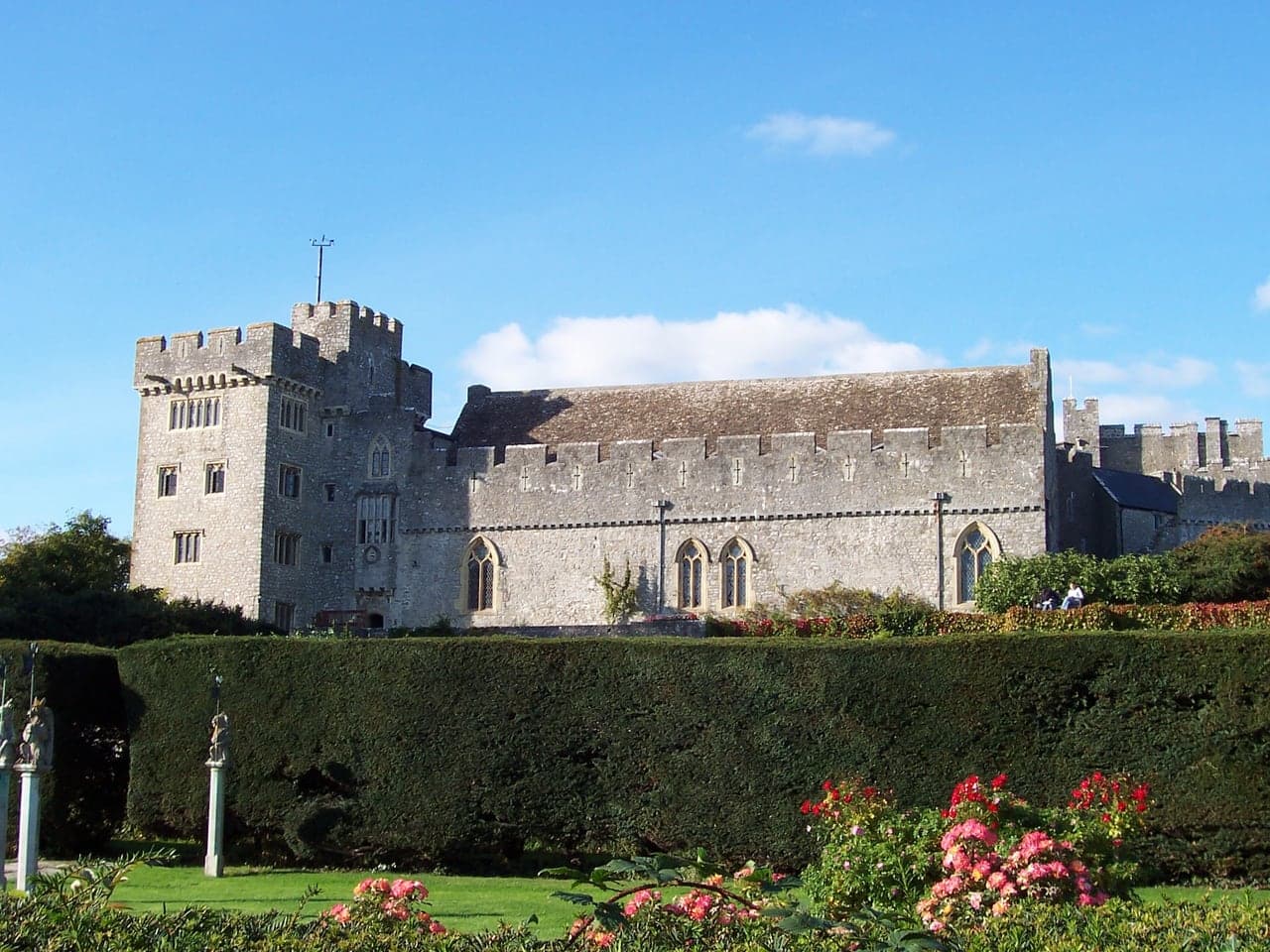 St Donat's Castle, home of UWC Atlantic College in Wales, above a yew hedge and a rose garden